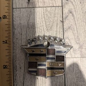 cadillac Luxury Car Emblem - Silver, Gold, and Black